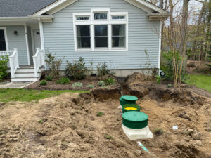 Suffolk County house with buried wastewater treatment system tank - Advanced Wastewater Solutions